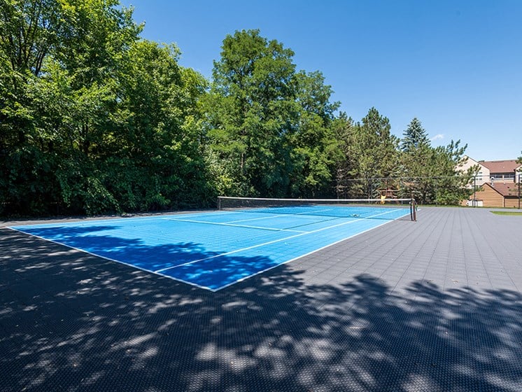 paved, blue tennis court